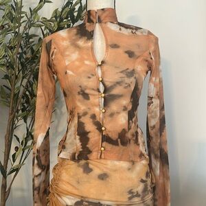 Kim Shui Mesh Print Pearl Top ($175) and matching Shirred Mesh Skirt ($175)